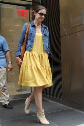 Reached an agreement ... Katie Holmes leaves her lawyer's office in New York  on July 7.