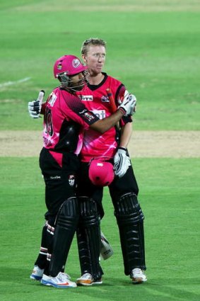 Sydney Sixers batsman Jordan Silk with teammate Ravi Bopara after taking victory during the Big Bash League match against the Adelaide Strikers at Adelaide Oval on January 5.