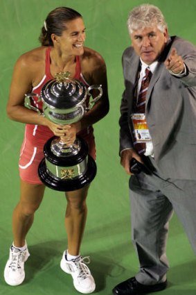 Paul McNamee with Amelie Mauresmo after winning the 2006 Australian Open.