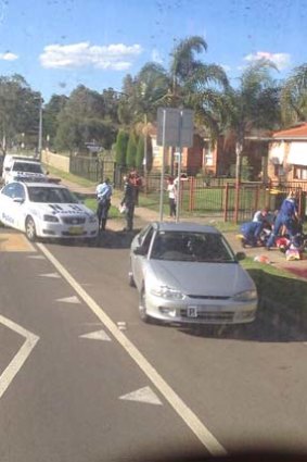 Doonside: Police and parademics at the crime scene.