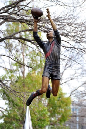 The statue of champion Essendon full-forward John Coleman has joined those of Ron Barassi, Don Bradman and Shane Warne on the MCG's Avenue of Legends. Coleman kicked 537 goals in 98 games.