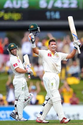 One more in the bag: Mike Hussey reaches a hundred against Sri Lanka in Hobart.