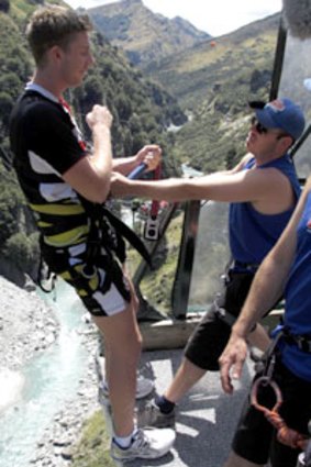 Zac Dawson preapres to bungee jump in New Zealand.
