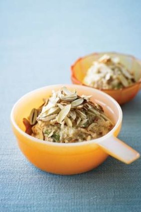 Chilled apple pear and quinoa porridge with raw almonds.