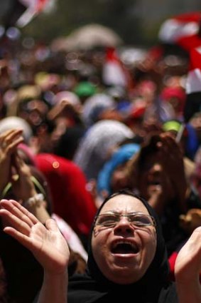 Division: An opponent of ousted president Mohammed Mursi demonstrates in Tahrir Square. Photos: Reuters
