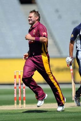 Oh yeah: Ryan Harris celebrates a wicket in the one-day game between Victoria and Queensland at the MCG.