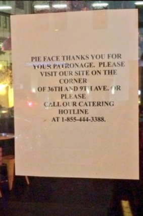 A sign posted on the window of the Pie Face shop on Fourth Avenue and East 13th Street.