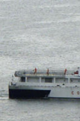 A Philippine Coast Guard vessel returns to port in Manila.
