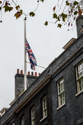 The Union flags flies at half mast over Prime Minister David Cameron's residence in Downing Street, London on Saturday.