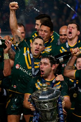 Cameron Smith and Billy Slater celebrate the World Cup win at Old Trafford in 2013.