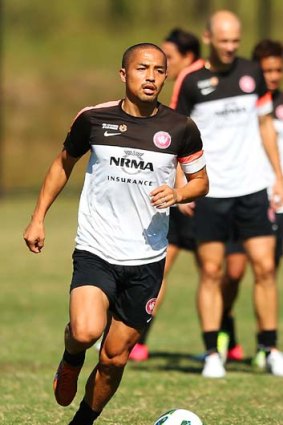 Shinji Ono of the Wanderers controls the ball during a training session.