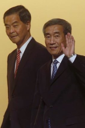 Against "confusion": Li Fei (right), deputy general secretary of the National People's Congress standing committee, with Hong Kong Chief Executive Leung Chun-ying.