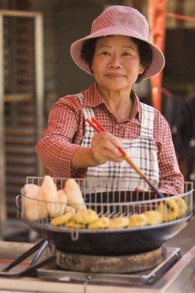 Street vendor selling Taiwanese delicacies.