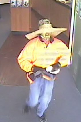 Police are searching for this man who robbed a Carina bank on Wednesday.