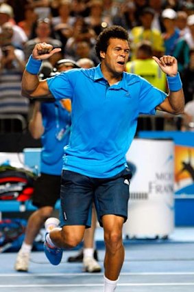 Jo-Wilfried Tsonga celebrates after defeating Gilles Simon.