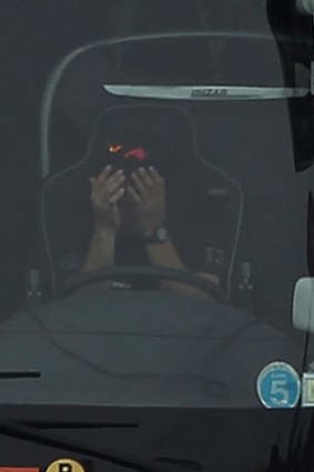 Nightmare: the embarrassed driver buries his head in his hands after realising his blunder.