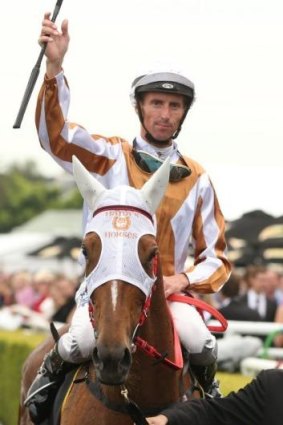 Nash Rawiller celebrates after booting home Hana’s Goal in the All Aged Stakes.