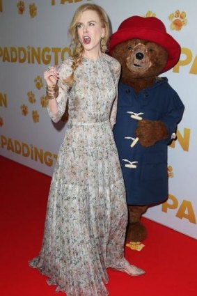Nicole Kidman hits the Sydney red carpet with Paddington Bear on Sunday morning. 
