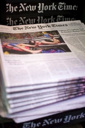 The publisher plans to eliminate 100 newsroom jobs and a smaller number of positions elsewhere