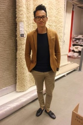 Tidy: Derek Lo goes for a conservative look for work.