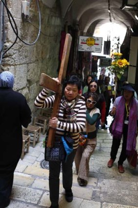Way of the Cross &#8230; pilgrims from the Philippines on the Via Dolorosa, where Christ is said to have carried His cross to Golgotha 2000 years ago.