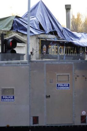 Clutha Vaults pub: a police cordon has been erected around the site of the crash.