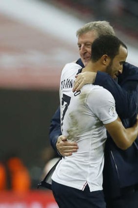 Roy Hodgson hugs Andros Townsend after the final whistle at Wembley.