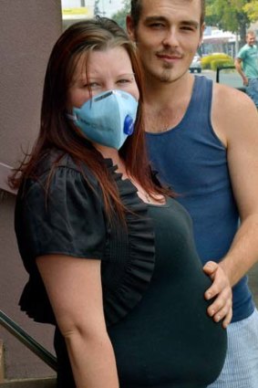 Pregnant mother Haylee Riess with her partner Josh Pollard.