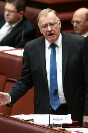 Government senator Ian Macdonald wants the mining tax repealed.