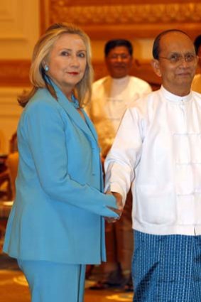 Reserving judgment ... Hillary Clinton is greeted by the Burmese President, Thein Sein, in the capital Naypyidaw yesterday.