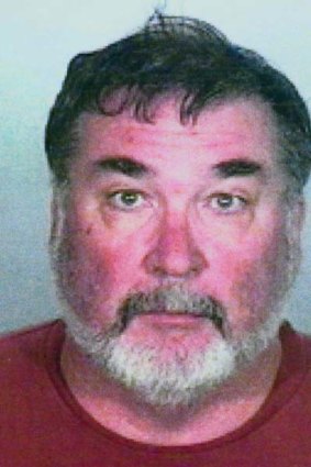 A 2002 booking photo shows former priest Stephen Kiesle, who had a record of sexually molesting children.