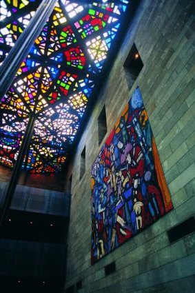 The baronial Great Hall's stained-glass ceiling at the National Gallery of Victoria.