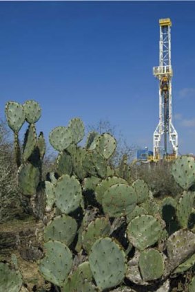 BHP Billiton's petroleum division is hoping that Petrohawk Energy's drilling rigs, such as this one in Texas, will help it produce one million barrels a day within five years.
