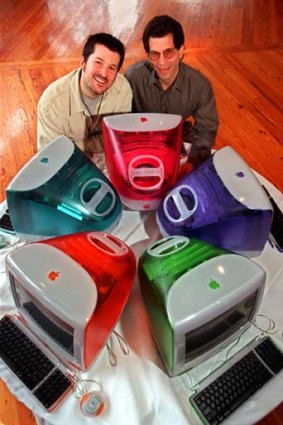 Jonathan Ive, left, Apple's then vice president of design, and Jon Rubinstein, Apple's senior vice president of engineering, pose behind five iMac computers in 1999.