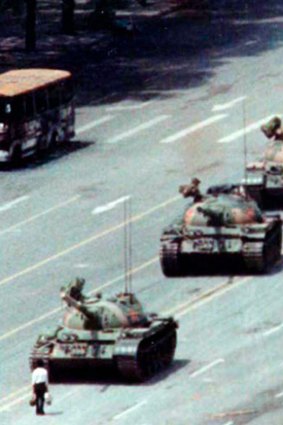 A man confronts a column of tanks during the 1989 protests in Tiananmen Square, Beijing.