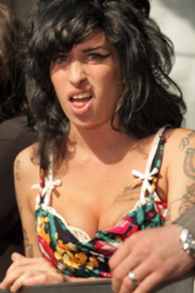 Unjustifiable violence ... Amy Winehouse accused of assaulting a fan.