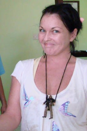 Schapelle Corby inspects jewellery of visitor at Kerobokan jail, Indonesia.