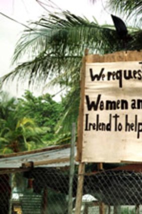 Asylum seekers on Manus Island erected a sign appealing for help.