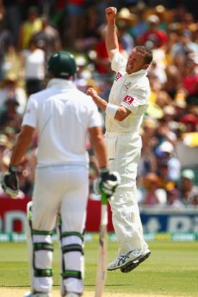 Peter Siddle celebrates taking the wicket of Graeme Smith.