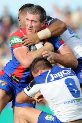 Hard to stop: Newcastle's Chris Houston scored two tries in his return to the first grade side.