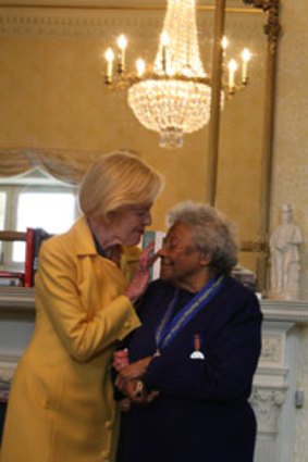 Emotional ... the Governor-General, Quentin Bryce, wipes a tear from Faith Bandler's eye during the ceremony.