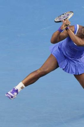 On track: Serena Williams during her demolition of Greta Arn yesterday.