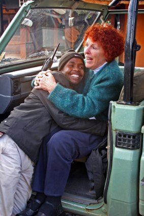 A little help ... Penny Crittall gets a lift from a local in South Africa.