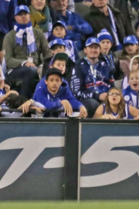 Adelaide's Jared Petrenko seals the deal as aghast North Melbourne fans look on.