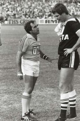 Dressing down: The Magpies' Bob Cooper (right).