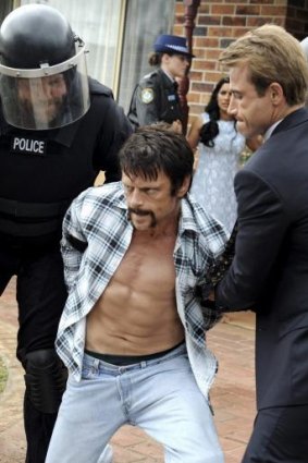 Capture ... Milat is finally arrested in a scene from the TV drama.