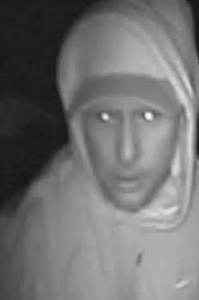 CCTV image of the suspect wanted for a taxi armed robbery.