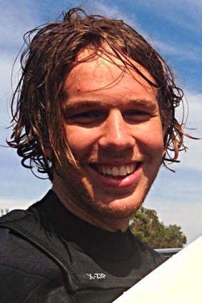 Zac Young, 19, was surfing with three friends when he was bitten on the legs by a shark.