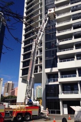A cherry picker used by police to examine Gable Tostee's apartment.