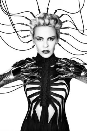 Chapter: Kylie Minogue models a Gaultier Medee gown for her X Tour, 2009.